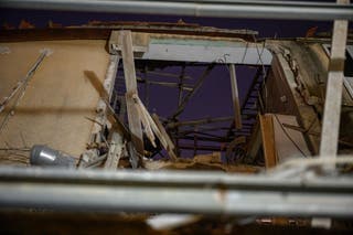 Damage is shown following an Iranian ballistic missile attack on March 18, 2026 in the Tel Aviv suburb of Ramat Gan, Israel